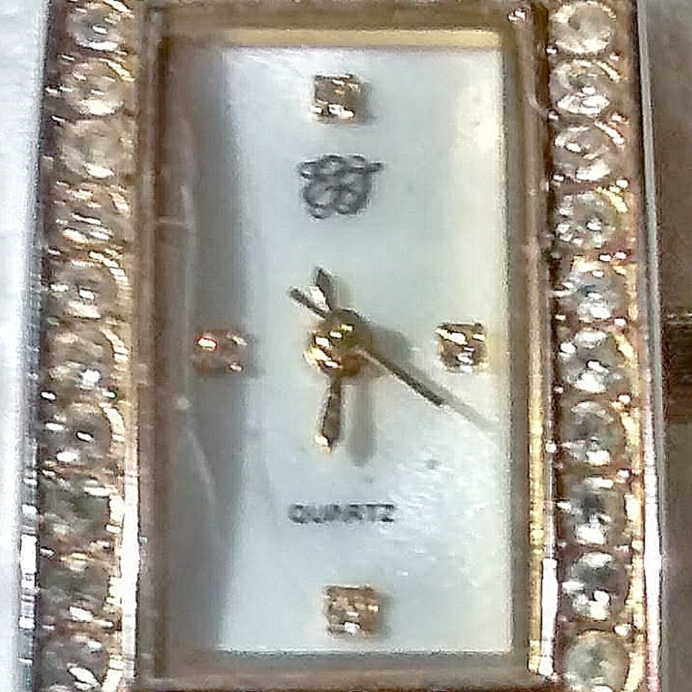 Gold wristwatch from EJ